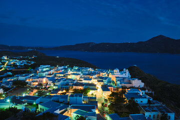 Naklejka premium Greek town Plaka aerial view in the evening. Milos island, Greece