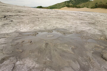 landscape of muddy volcanoes buzau romania an important tourist attraction