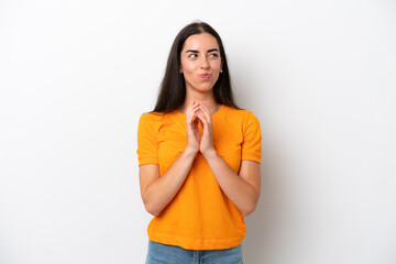 Young caucasian woman isolated on white background scheming something