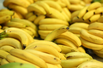 Banana background on a shelf in market. Organic eating. Farmer's food.