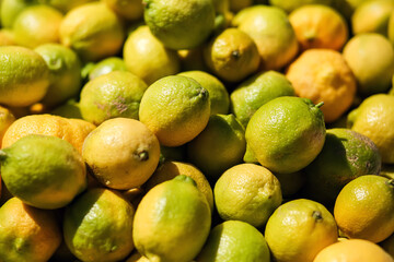 Lemon background on a shelf in market. Organic eating. Farmer's food.