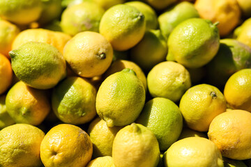 Lemon background on a shelf in market. Organic eating. Farmer's food.