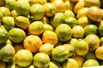 Lemon background on a shelf in market. Organic eating. Farmer's food.