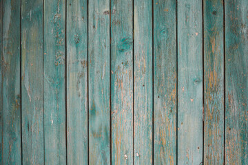 Old blue weathered wooden fence texture background . old wooden planks background