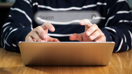 Search bar of internet browser and business man hand on laptop with visual screen search button on...