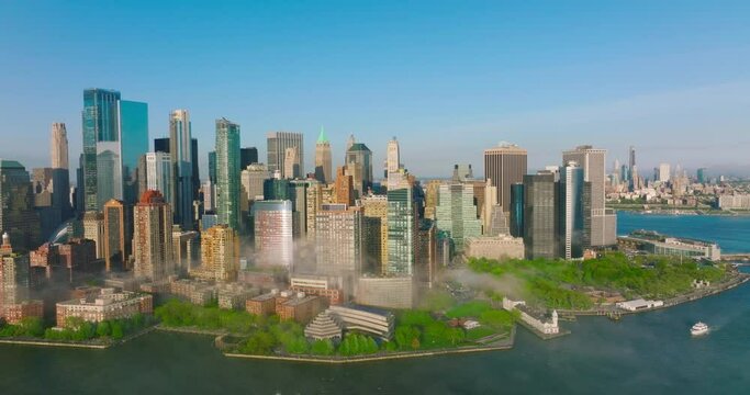 Sunny picture of beautiful Manhattan Island. Amazing buildings of outstanding New York architecture.