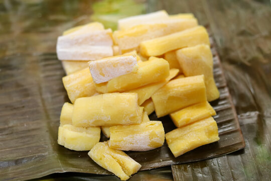 Tapai or Tape or Peuyeum are traditional food snack from indonesia, made from fermented cassava. Served on banana leaf