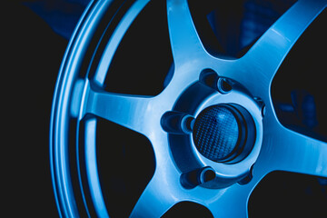 Car metal disc at the black background