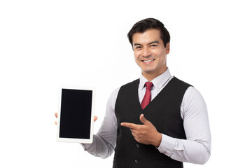 Portrait young businessman working on new tablet, mobile phone in white studio. Portrait of a confident business man in black suit feeling happy and smile holding tablet isolated on white.