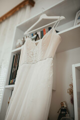 Beautiful wedding dresses on a hanger stock photo.