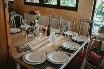 Rustic table decoration. Decoration with flowers.