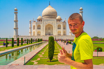 Taj Mahal panorama in Agra India with amazing symmetrical gardens.