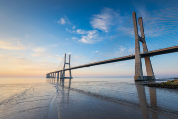 Vasco da Gama bridge over tagus river in Lisbon, Portugal, at sunrise