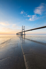 Vasco da Gama bridge over tagus river in Lisbon, Portugal, at sunrise