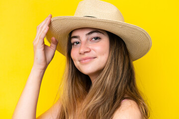 Young caucasian woman isolated on yellow background