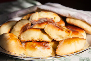 Homemade baked pies on a plate