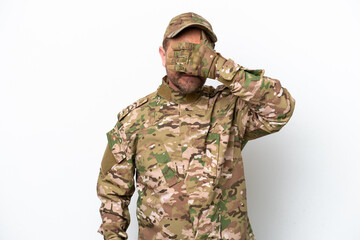 Military man isolated on white background covering eyes by hands. Do not want to see something