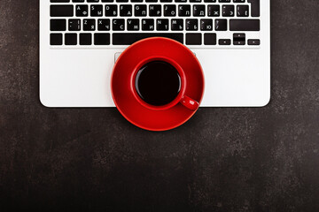 Creative promotion composition for Black friday with laptop on black background. Flat lay, top view, overhead, mockup, template. Minimal abstract background. Online shopping, sale, promo. Web banner