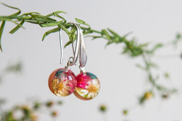 Real flowers in epoxy resin, jewelry