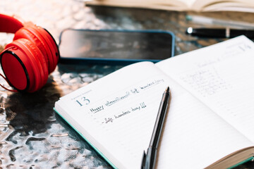 Happy lefties day! A notebook with the day August 13 with the words 