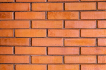 Brickwork of a wood-burning stove. Bricks, clay, seams. Background image. Close-up