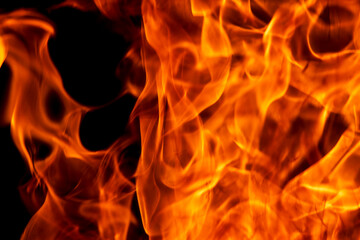 Abstract flame, fire flame texture, background. Tongues of fire on a dark background.