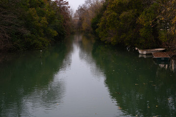 little boats on the river in autumn