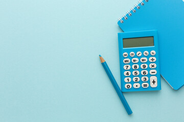 blue calculator on a colored background