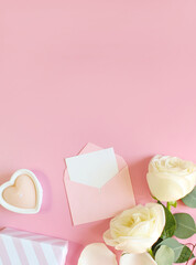 Flowers composition. Rose flower petals on pastel pink background. Valentines day, mothers day, womens day concept. Flat lay, top view, copy space