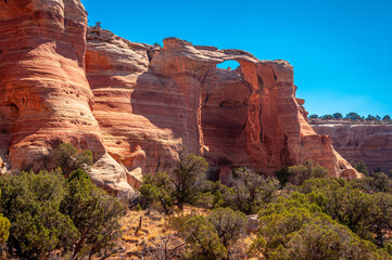 Red Rock Formations and Natural Arch in Colorado Canyon