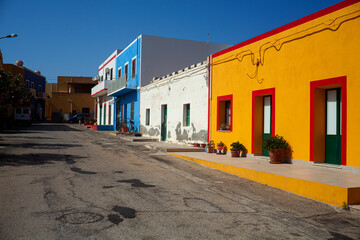 View of a typical street of Linosa with colorful house