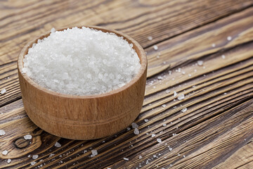 salt in a hodgepodge on a wooden table