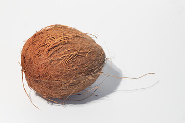 Whole coconut isolated on white background, tropical exotic fruit