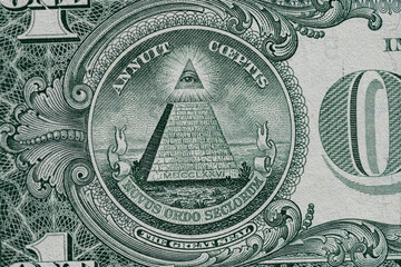 Fototapeta na wymiar Fragment of one American dollar banknote close-up.