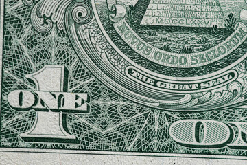 Fragment of one American dollar banknote close-up.
