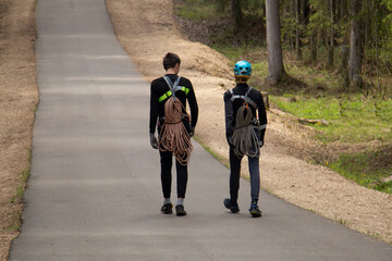 Young people conduct mountaineering training in the park. Fitness on the street.