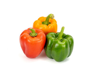 Capsicum - Bell Pepper green, red, orange, yellow isolated in plain extendable background, macro detailing, studio lighting, with ample copy space all around. 