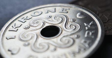 1 Danish krone coin close up. National currency of Denmark. Money illustration for news about...