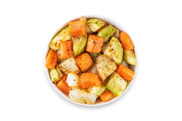 Roasted potato, carrot and zucchini bowl on a white isolated background