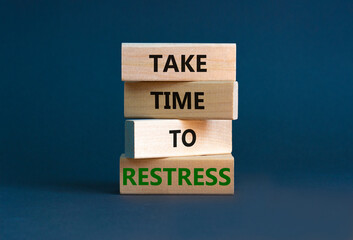 Take time to restress symbol. Concept words Take time to restress on wooden blocks. Beautiful grey...