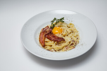 carbonara pasta on a white background
