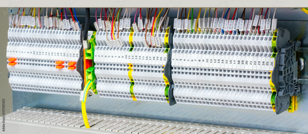 Poster color wires in a box of distribution of an electricity, plc control panel with wiring, lectric contr