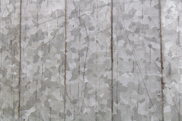 Aluminum rough and destroyed metal texture with vertical lines, scratches, and blotches