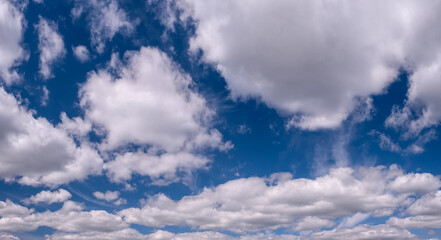 blue sky background with tiny clouds