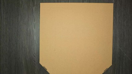 Pizza box moves, opens and pizza cuts into pieces. Stop motion animation of eating pizza - Powered by Adobe