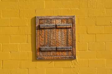Rustic shutters and wall