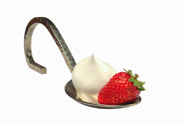 Strawberries with cream lie on a large chrome spoon. White background.