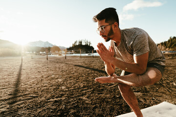 Young man practicing yoga