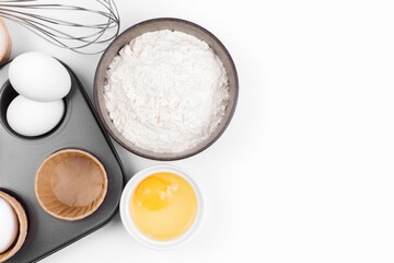 Baking ingredients on white background. Food background. Top view 