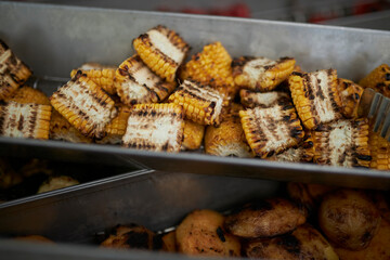 Corn cooked on the grill. Grilled vegetables 